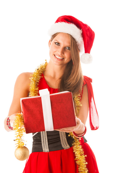 Beautiful young woman in santa claus dress standing isolated ove - 写真・画像