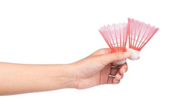 hand holding Red Plastic Badminton shuttlecock isolated on white background - Foto, immagini