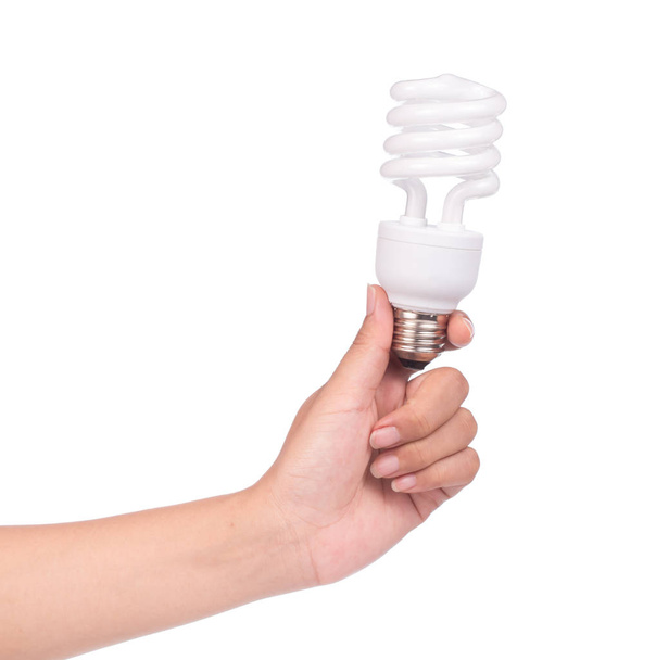hand holding Illuminated light bulb isolated on white background - Zdjęcie, obraz