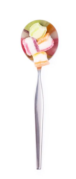 gelatinas coloridas en cuchara aislada sobre fondo blanco
 - Foto, Imagen