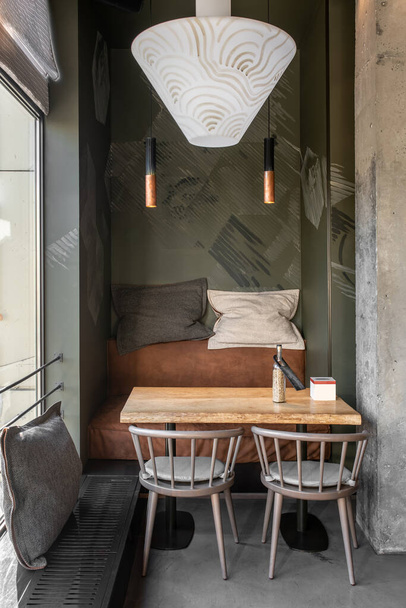 Interior of modern cafe in loft style - Foto, afbeelding