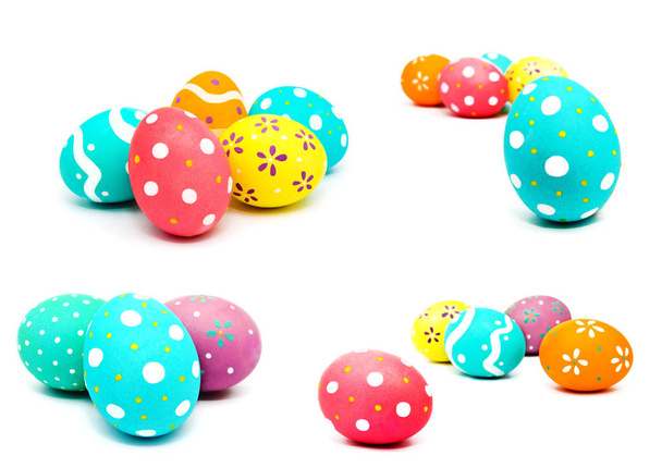 Colección de fotos perfectas coloridos huevos de Pascua pintados a mano aislados sobre un fondo blanco
 - Foto, imagen