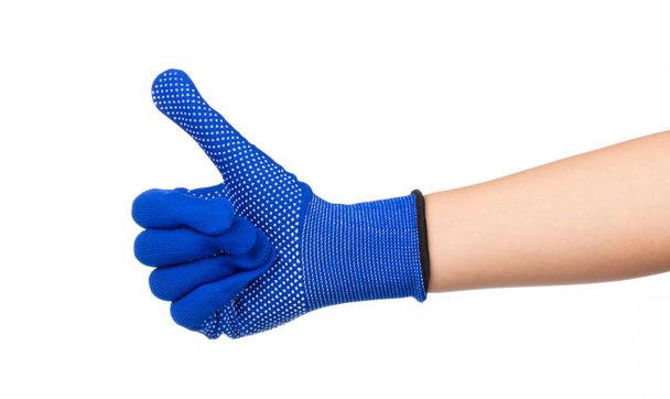 kéz visel kék kesztyű elszigetelt fehér alapon - Fotó, kép