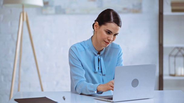 attractive businesswoman typing on laptop keyboard  - Materiał filmowy, wideo