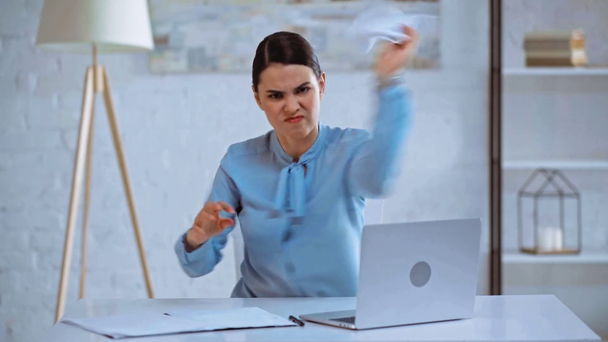 angry businesswoman throwing in air documents  - Imágenes, Vídeo