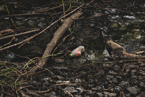 Pollution is the introduction of contaminants into the natural environment that cause adverse change - Photo, Image