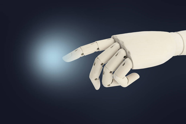 Hand des Roboters aus Holz zeigt auf dunklen Hintergrund - Foto, Bild