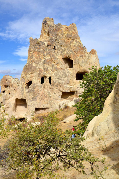 Probably the best known feature of Cappadocia, Turkey found in its very heart, are the fairy chimneys of Goreme and its surrounding villages  - Fotografie, Obrázek