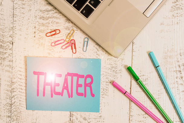 Word writing text Theater. Business concept for building or outdoor area in which plays and dramatic perforanalysisces Trendy metallic laptop blank sticky note colored clips pens lying vintage. - Foto, Bild