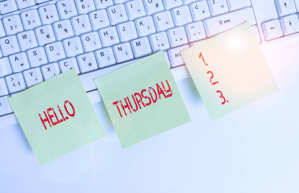 Handwriting text Hello Thursday. Concept meaning the greeting used to welcome the day after wednesday Three empty green square papers by the pc keyboard with copy space. - Photo, Image