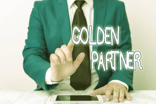 Word writing text Golden Partner. Business concept for all work honestly and for a common purpose and target goals Businessman with pointing finger in front of him. - Fotó, kép