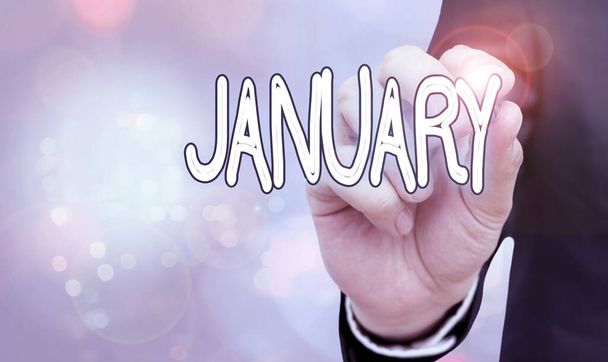 Sinal de texto mostrando janeiro. Foto conceitual primeiro mês do ano e considerado o segundo mês de inverno
. - Foto, Imagem