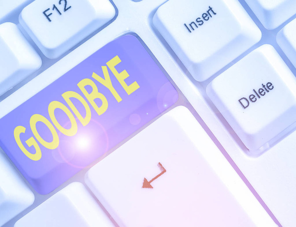Handwriting text Goodbye. Concept meaning used to express good wishes when parting or end of a conversation. - Φωτογραφία, εικόνα