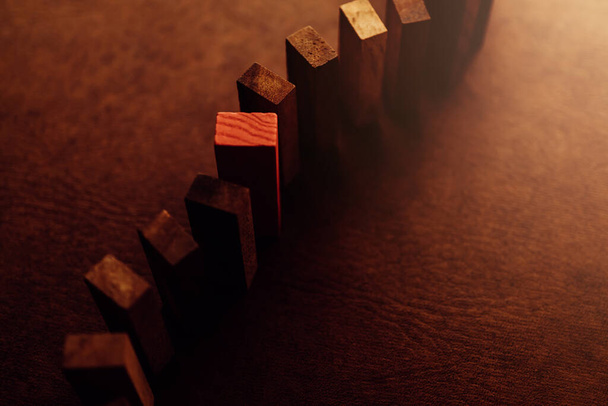 red wooden block with others wooden block in a row leadership ideas concept - Fotografie, Obrázek