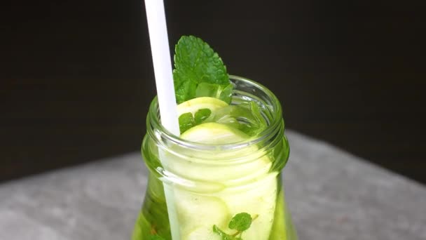 Cocktail mojito. With ice and a straw. - Footage, Video