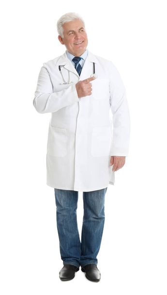 Full length portrait of senior doctor on white background - Foto, Imagem