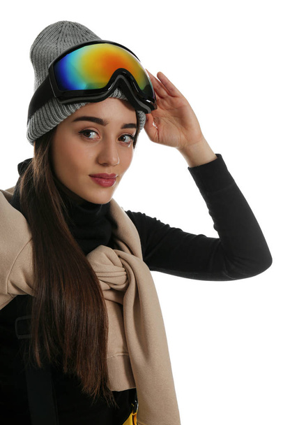 Woman wearing stylish winter sport clothes on white background - Foto, afbeelding