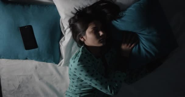 Woman Suffering Insomnia at Night Top View - Felvétel, videó