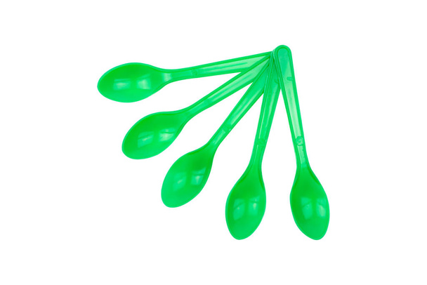 Green plastic spoon isolated on white background - Photo, Image