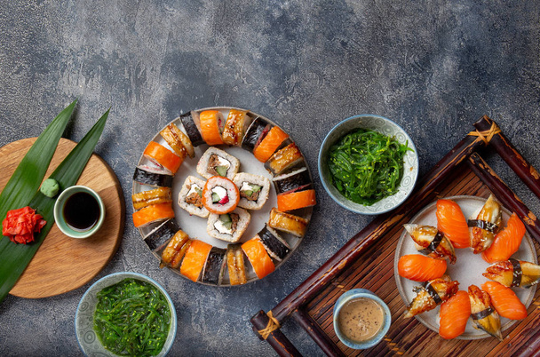 Sushi and rolls sets. Japonese food. top view. - Zdjęcie, obraz