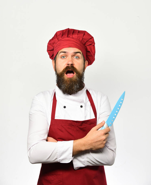 Cooking equipment and cuisine concept. Cook with surprised face - Fotografie, Obrázek