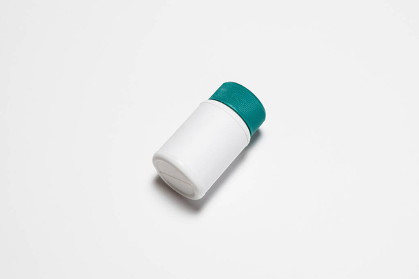 Plastic White Pill or vitamin dietary supplement Bottle, Medical drug plastic bottle isolated on white background with clipping path. High-resolution photo.Top view - Valokuva, kuva