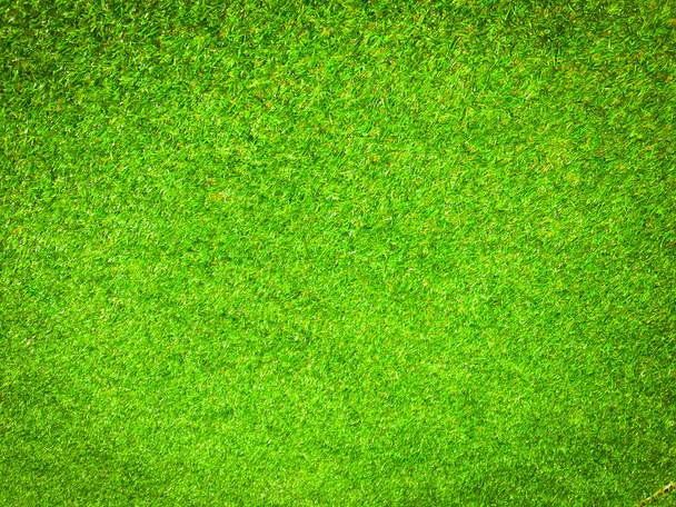 Nahaufnahme Ansicht von grünem Gras Fußballfeld Hintergrund. Tapeten für Arbeit und Design. - Foto, Bild