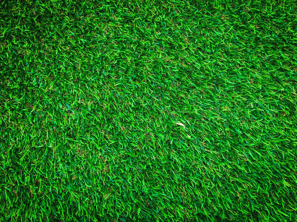 Vista de cerca del fondo del campo de fútbol de hierba verde. Fondos de pantalla para trabajo y diseño
. - Foto, Imagen