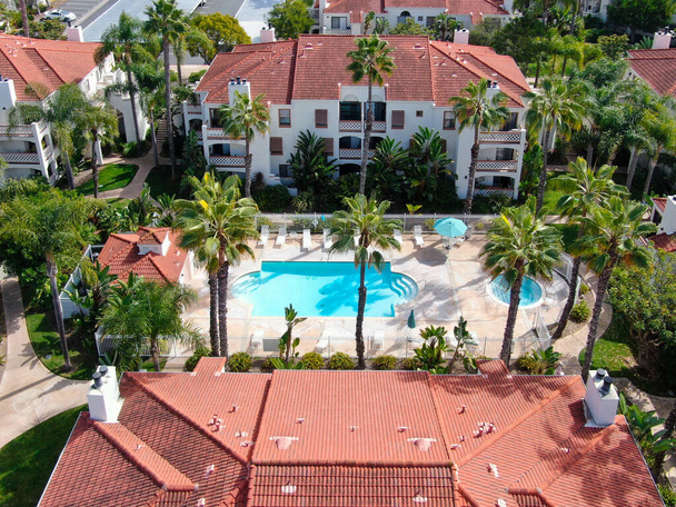 Aerial view of typical Southern California Spanish style residential condo with swimming pool - Photo, Image
