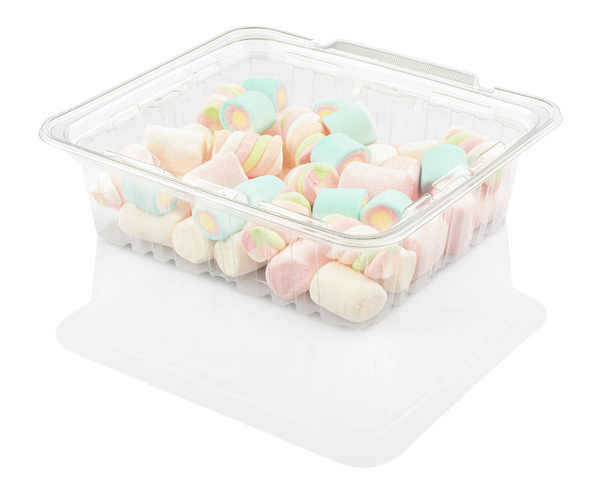 caramelo de malvavisco en un recipiente de plástico aislado sobre un fondo blanco con camino de recorte
 - Foto, imagen