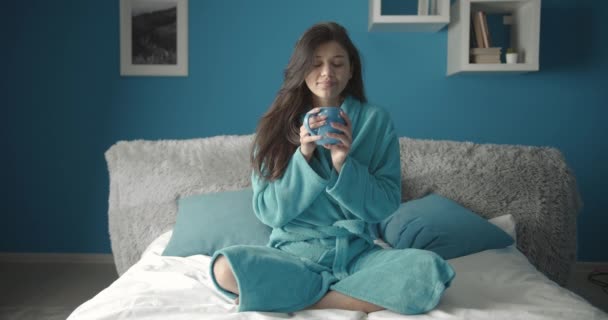 Woman Drinking Hot Coffee in Bed - Πλάνα, βίντεο