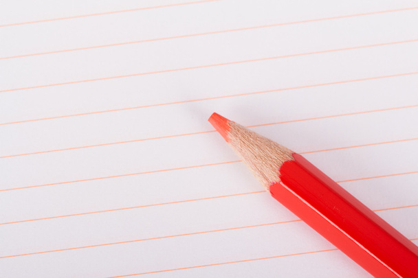 Red Pencil on Notebook - Φωτογραφία, εικόνα