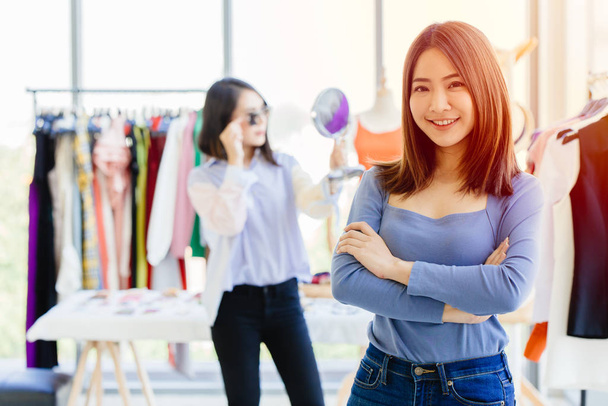 young new SME business owner happy and successful teen portrait with fashion clothing shop background - Valokuva, kuva