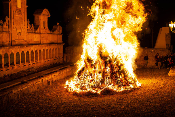 LEONFORTE, SICILY - APRIL, 19: Big fire next to the Granfonte fountain during the traditional Good Friday procession on April 19, 2019 - Fotó, kép