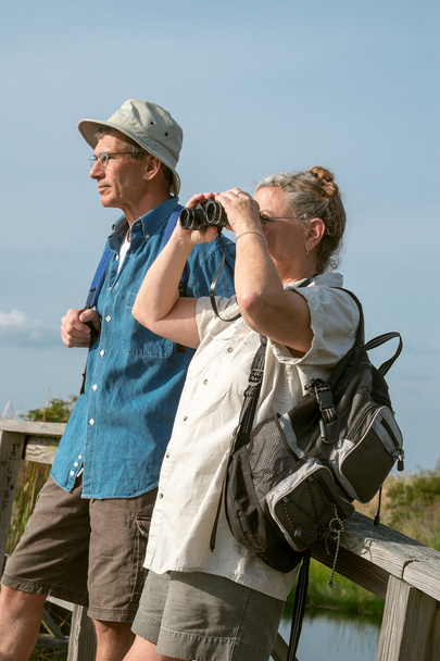 Senior Couple Hiking and Birdwatching with Binoculars - Fotoğraf, Görsel