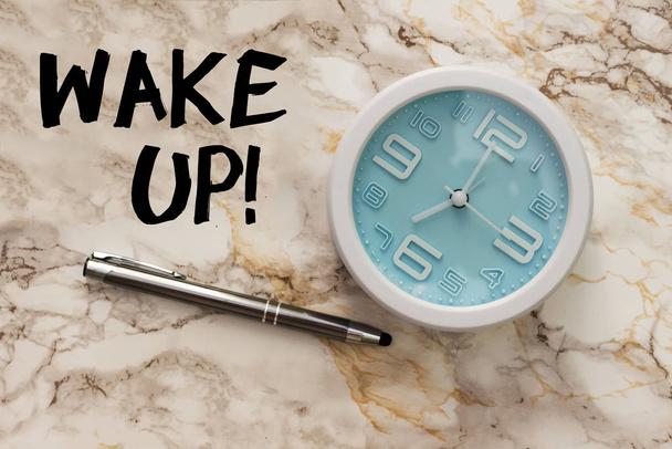 alarm clock showing seven o'clock with  wake up concept  - Photo, Image