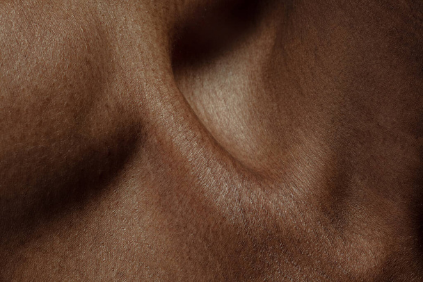 Texture of human skin. Close up of african-american male body - Zdjęcie, obraz