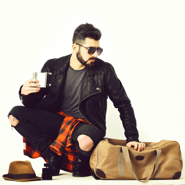 Bearded man, caucasian hipster with moustache holding flask - Foto, Bild