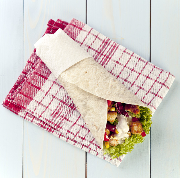 tortilla wraps with meat and vegetables - 写真・画像