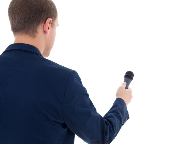 δημοσιογράφος κρατώντας μικρόφωνο που απομονώνονται σε λευκό φόντο - Φωτογραφία, εικόνα