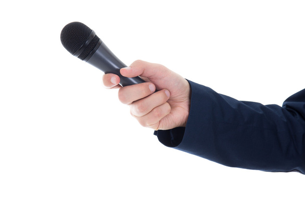 Mano maschile con microfono isolato su bianco
 - Foto, immagini