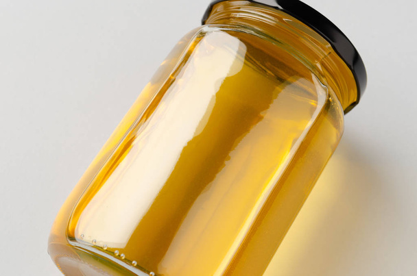 Honey jar mockup. Closeup. - Фото, изображение