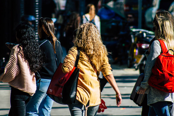 Tel Aviv Israel February 20, 2020 View of unidentified people walking in the streets of Tel Aviv during a sunny day in winter - Photo, Image