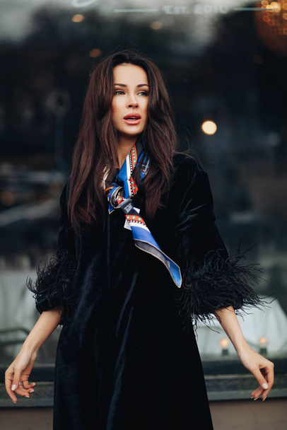 Stylish beautiful woman holding hot drink outdoors - Valokuva, kuva