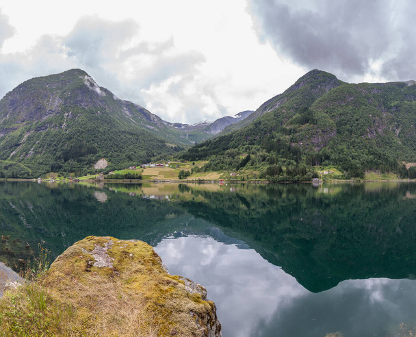 End of fjord, Beautiful Norwegian landscape. view of the fjords. Norway ideal fjord reflection in clear water. selective focus - 写真・画像