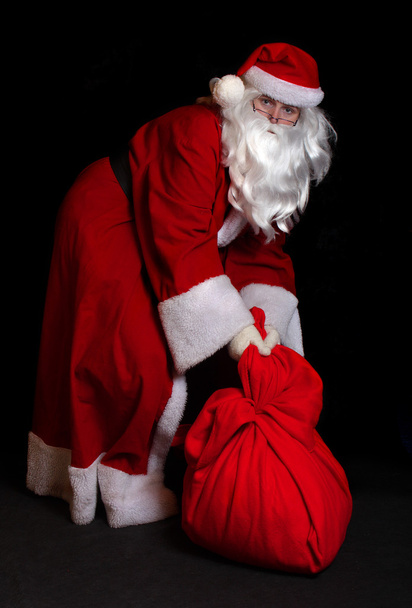 Santa claus geopend een OSS - Foto, afbeelding