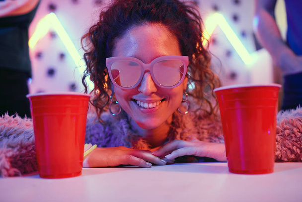Party woman with drinks - Фото, зображення