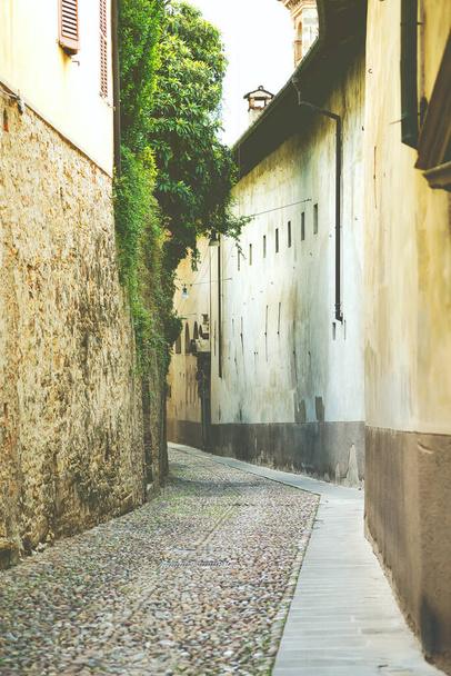 the old narrow street in old city of Bergamo, Italy - Photo, image