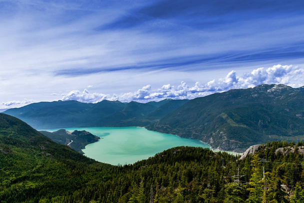 Blue sky, teal ocean and white clouds, Squamish, BC, Canada - Photo, Image
