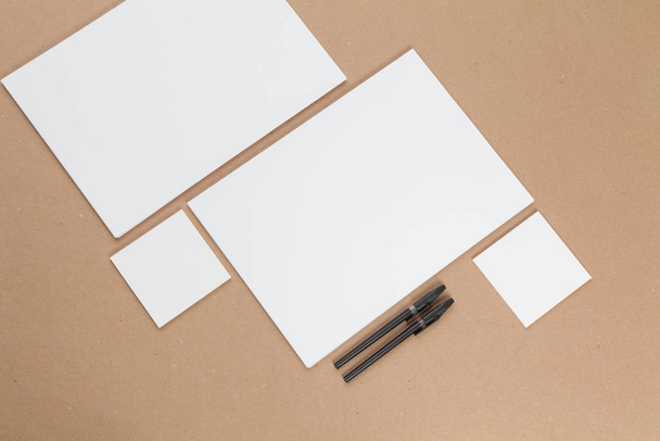 mock up concept. cards Papers on beige background. Top view, flat lay, copy space - Fotoğraf, Görsel